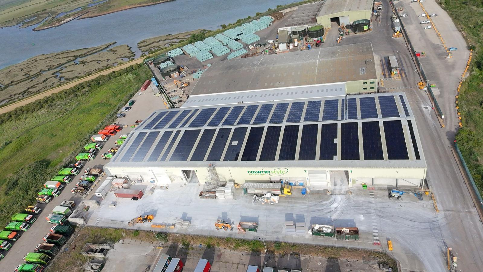 Commercial solar panels installed on an agricultural building roof