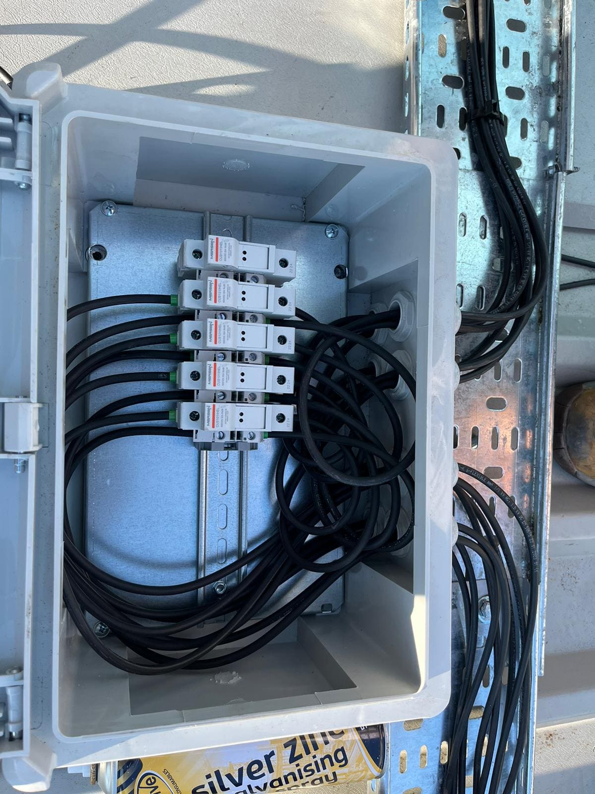 DC combiner box with string fusing and isolators wired for the ground-mounted solar array