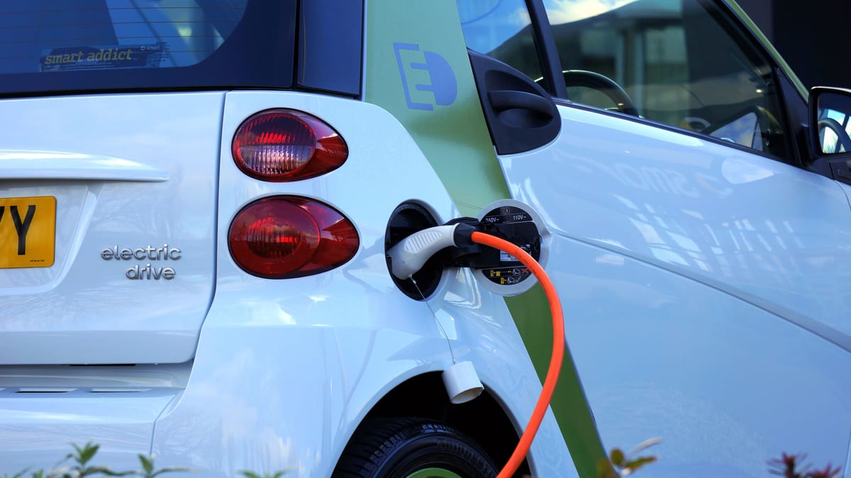 Electric vehicle charging at a fleet depot